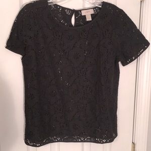 Loft black lace short sleeved blouse. Size M. New w/ tags. Button detail on back
